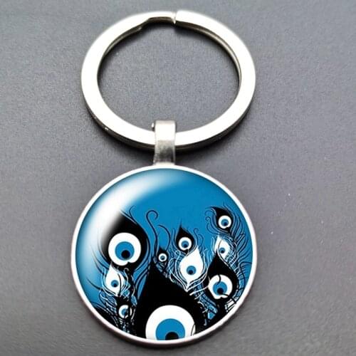 Blue one-eyed religious photo keychain car keychain horror keychain