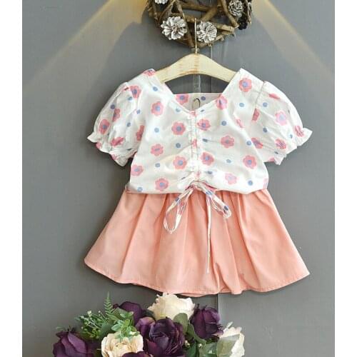 Girls' casual suit 2021 summer new style Korean flower print short-sleeved + short skirt cute toddler clothes two-piece set