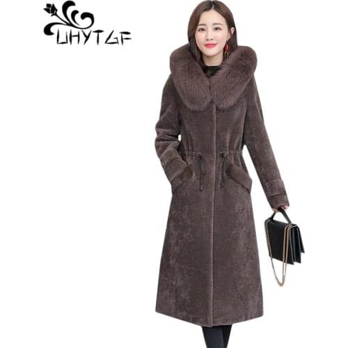 UHYTGF quality sheep sheared winter fur coat women Lace-up Slim long coat loose plus size jacket hooded fur collar fur coat 906