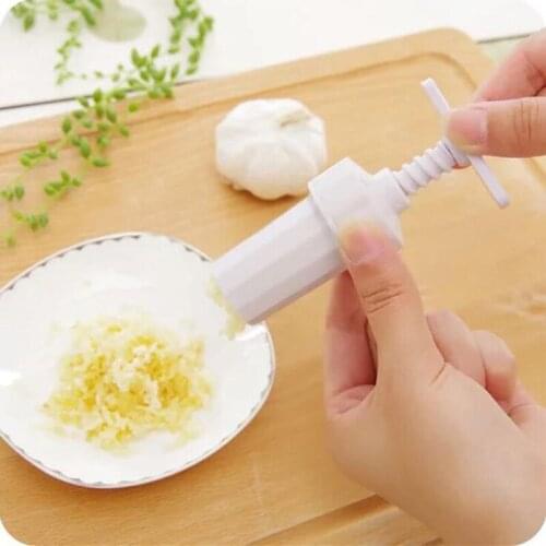 9*5.5cm Creative Spinning Garlic Pressing Plastic Kitchen Simple Garlic Gadget