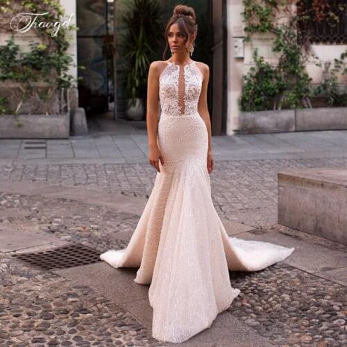 Traugel Sexy Backless O Neck Illusion Lace Mermaid Wedding Dresses Elegant Appliques Beaded Court Train Trumpet Bridal Gowns