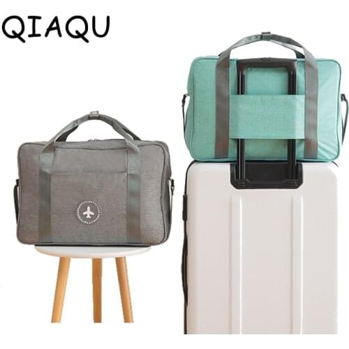 Travel bag Cationic Foldable hand luggage large capacity boarding bag waterproof short journey storage bag can set on trolley
