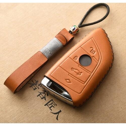 Genuine Leather Car Remote Key Cover Case For BMW X1 X5 X6 F15 F16 F48 BMW 1 / 2 Series Plating Remote Controller Key Bag Holder