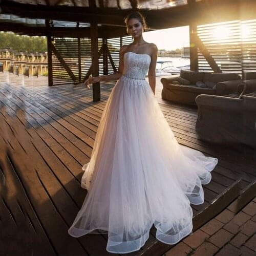 Luxury 2020 Strapless Sequined Crystal Sashes A-line Wedding Dress Tulle Sweep Train Bride Dress Women Gowns robe de mariee