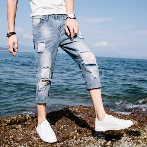 High quality 2020 Summer Casual Ripped hole denim Distressed Cowboy hip hop Students thin jeans male Calf Length pants homme