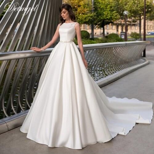 Detmgel Sexy V-Neck Backless Tulle A-Line Wedding Dresses 2020 Gorgeous Appliques Princess Bridal Gown Customized Wedding Gown