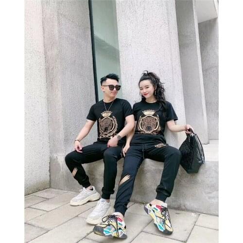 Male and female designers set of 2 high quality fashion suits Crown rhinestones mens and womens sportswear fashion T-shirt+jog