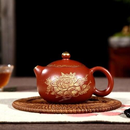 Yixing recommended paint carved painted peony xishi undressed ore wholesale direct zhu zhu mud dahongpao all hand-made