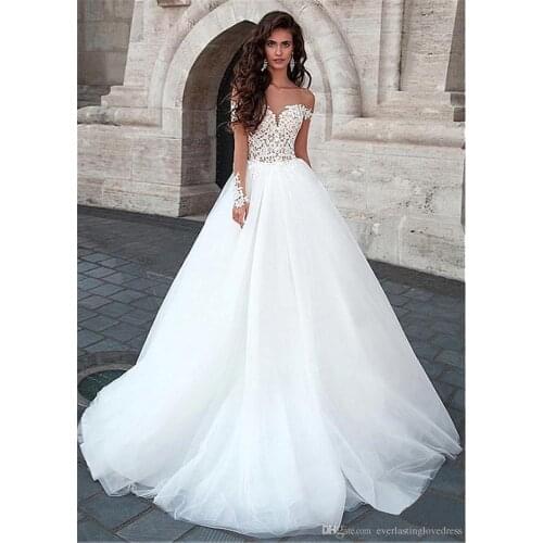 Attractive Tulle Wedding Dresses 2019 A-Line White Designer Long Sleeve Open Back Bridal Dresses Court Train