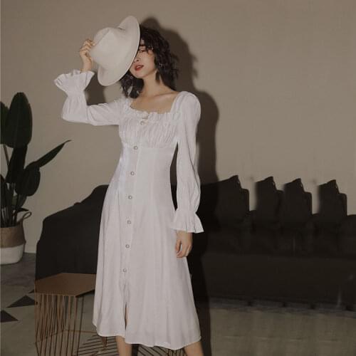 2020 New Autumn Women Retro Fairy White Dress French Fashion High Waist Slim A Line Dress Long Flare Sleeve Pearl Button Dress
