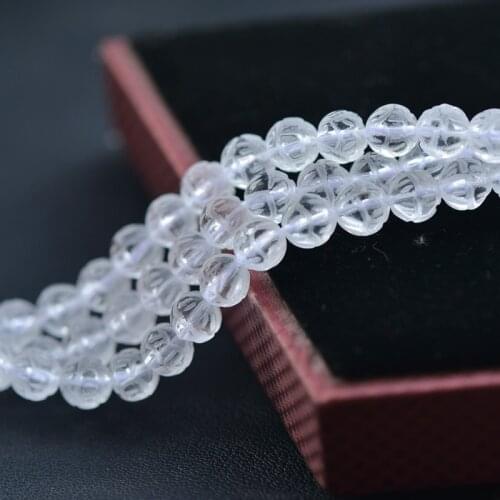 Joanlyn Grade AAA Natural Clear Quartz Beads Round with Lotus Carved 8mm-14mm 15 Inch Strand CQ34