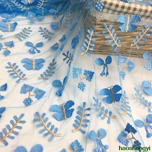 The new butterfly mesh yarn polyester embroidered lace fabric, fashion embroidered lace fabric
