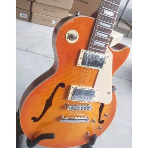 Guitarra Eléctrica alta calidad , instrumento musical de madera de arce flameado, F hole，Silver hardware，exhibición de fotos re