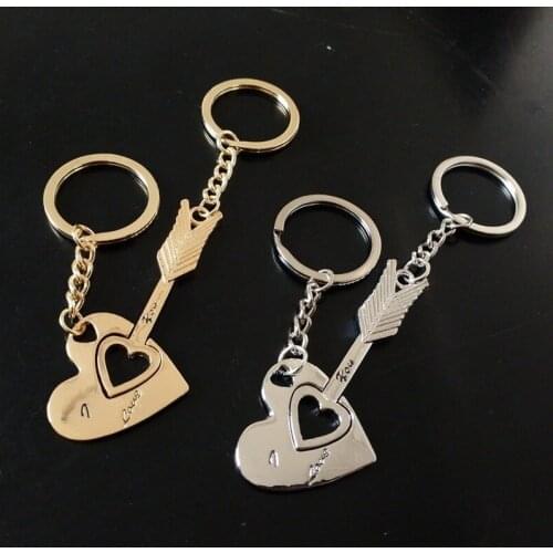 Couples Heart Piercing Keychain Creative Metal Keyring Bag Pendant Accessories wholesale