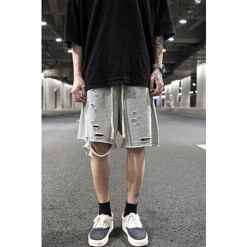 High street wind hole knife cut hem raw edge cotton shorts hip-hop style solid color wild summer skateboarding pants men