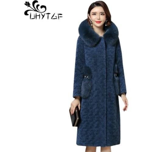 UHYTGF Plus size Fur collar Hooded Long Coat Fur Jacket Autumn Winter Faux Fur Coat Women Warm Female Outwear Plush Overcoat 517
