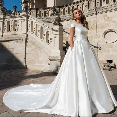 Custom Made Sexy Backless Best France Satin Wedding Dresses With Pockets Vestido Blanco O-neck Short Sleeve White Bridal Gowns