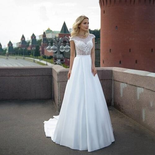 Romanic O-Neck Appliques A-Line Wedding Dresses Sheer Bridal Dress Illusion Back New Floor Length Bridal Gowns