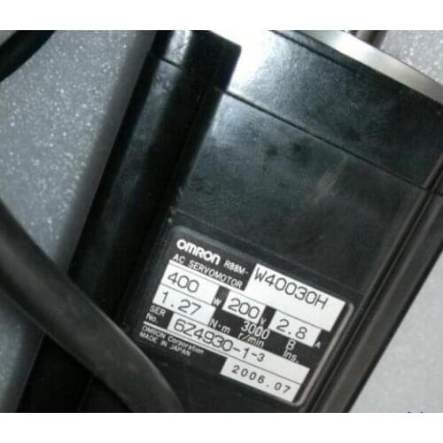 R88M-W40030H SERVO MOTOR , used in good condition . 80% appearance new , good working , free shipping
