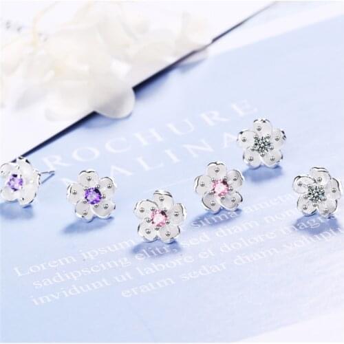Small fresh and lovely simple personality temperament wild crystal sakura flowers silver plated stud earrings WE077