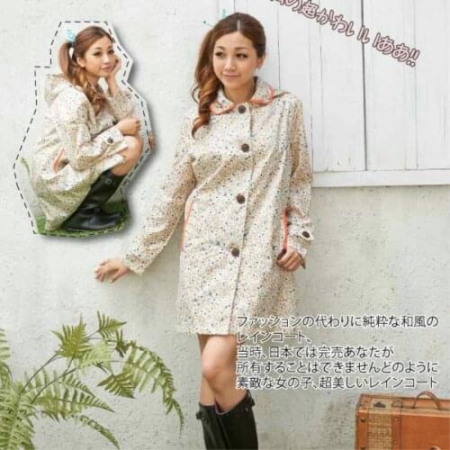 Freesmily Womens Stylish Rain Poncho Waterproof Rain Coat With Hood Sleeves and Pocket Floral raincoat