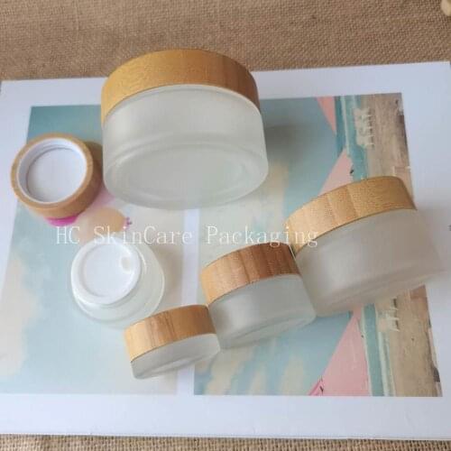 Wholesale Custom Logo Face Cream Lip Gloss Cream Cosmetic Jar With Bamboo Lid For Eye Cream CBD Hemp Cream Glass Containers