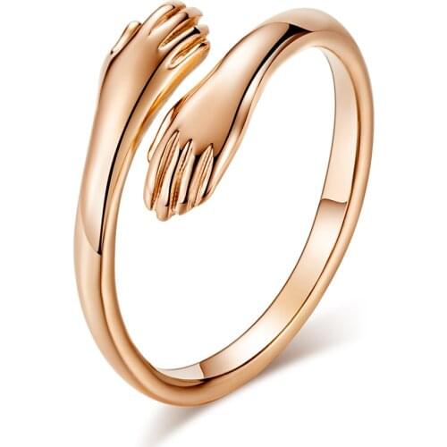 Korean version of romantic two-handed love hug titanium steel ring rose gold hug and hug Valentines day gift customization