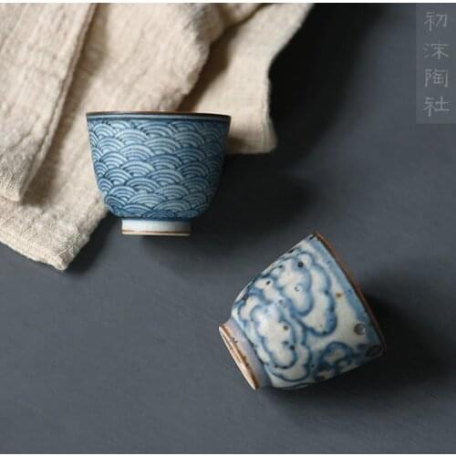 Foam at the beginning of the jingdezhen manual cup under the glaze porcelain cup xiangyun moire kung fu tea cups