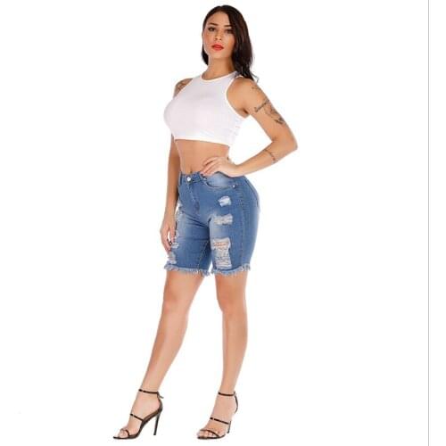 European and American womens fashion ripped mid-waist hot sale bag hip denim shorts