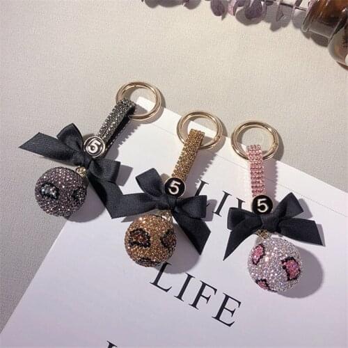 Japan Korea creative leopard pattern full diamond ball car keychain bowknot ring personalized fashion female bag key pendant