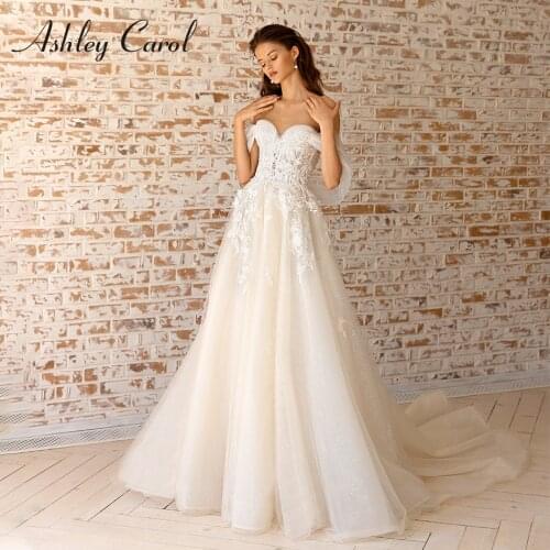 Ashley Carol A-Line Wedding Dress 2021 Delicate Beaded Lace Appliques Bride Sweetheart Backless Cap Sleeve Beach Bridal Gown
