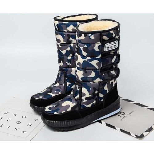 Winter new plus velvet warm cotton shoes couple models men and women boots plus size high tube waterproof and ski boots