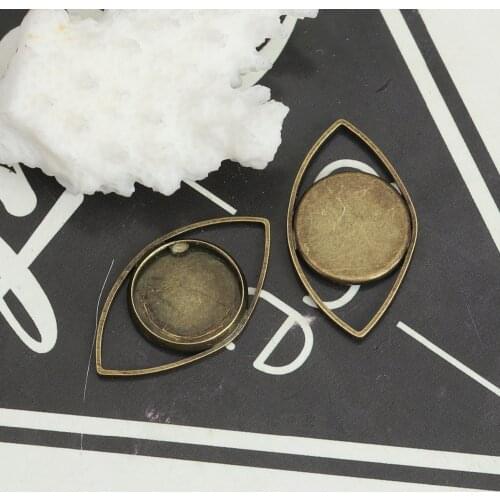 DoreenBeads Copper Cabochon Settings Connectors Findings Eye Antique Bronze (Fits 12mm Dia.) DIY Charms 27mm x 15mm, 10 PCs