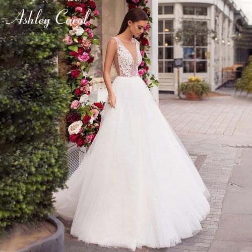 Ashley Carol A-Line Wedding Dress 2021 Glamorous Backless V-Neck Beaded Appliques Bride Sleeveless Shiny Tulle Beach Bridal Gown