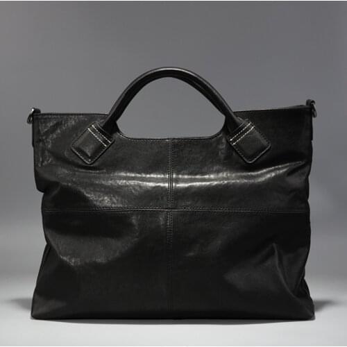 Handbag mens leather horizontal casual handbag leather shoulder slung European and American simple trendy mens bag