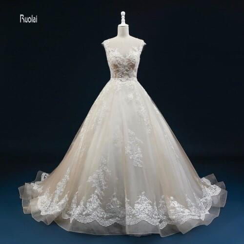 2017 New Arrival Amazing Ball Gown Champagne Wedding Dresses Appliques Sash Scoop Sweep Train Sheer Back Bridal Gown Custom Made