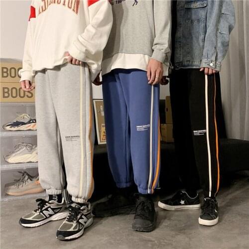 19 winter new color contrast plus velvet casual pants mens Japanese retro simple sports beam foot pants men