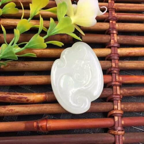 The new Hetian jade fine Ruyi Feng pendant 1999