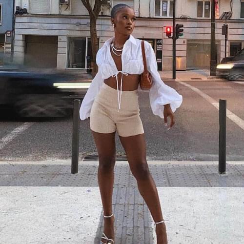 European and American womens clothing 2021 autumn new style Lapel Lantern Sleeve pleated lace up exposed navel shirt womens to