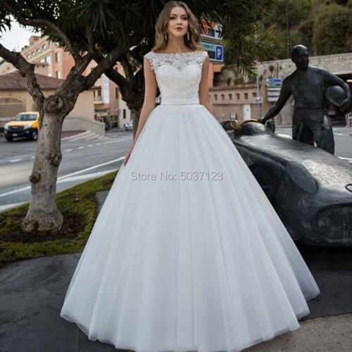 2020 Luxury White Ball Gown Wedding Dresses Lace Appliques Sleeveless Scoop Backless Vestidos De Noiva Court Train Bridal Gown