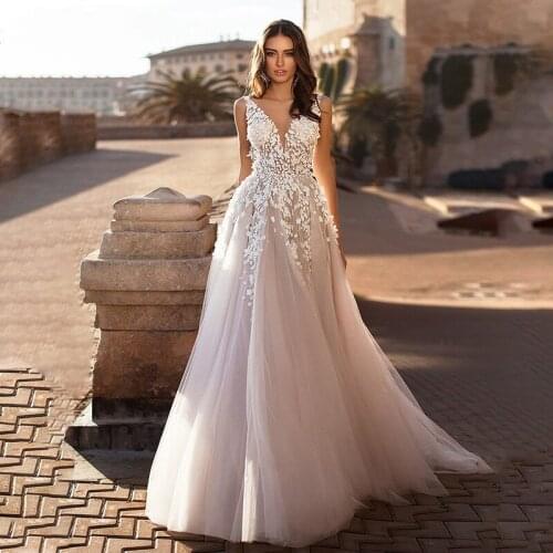 Beach Champagne Wedding Dresses 2021 Backless 3D Flowers Sleeveless V-neck Boho A-Line Princess Bridal Gowns Vestidos De Novia