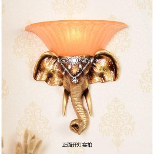 Restore ancient ways elephant wall lamp. The head of a bed resin corridor wall lamp