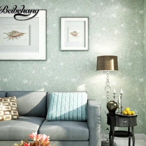 Beibehang the old retro mottled gray solid gray concrete industrial wind nonwoven wallpaper plain clothing store bar wallpaper