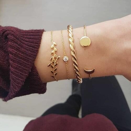 Exaggerated trend leaves thick twist drill crescent disc four-piece bracelet jewelry