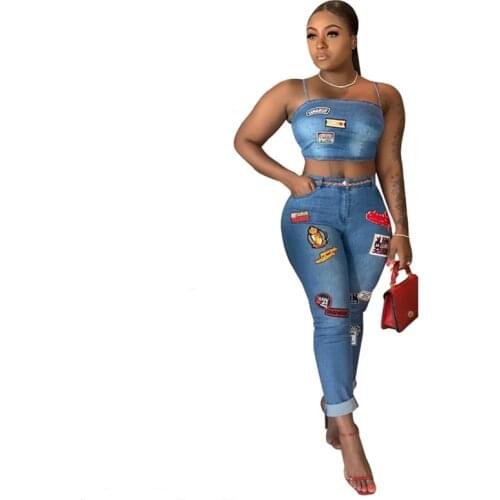 OMILKA Denim Blue 2 Piece Set Women 2020 Summer Spaghetti Strap Cartoon Appliques Crop Top and Long Jeans Pant Club Party Outfit