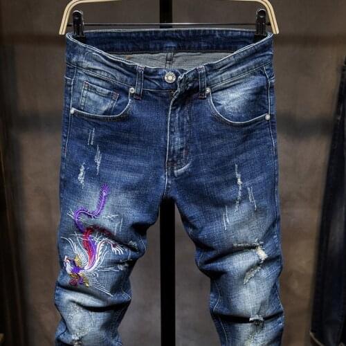 New Brand Mens Denim Trousers Fashion Mens Slim Fit Hole Ripped Jean Pants Male European Embroidered Straight Pants Plus Size