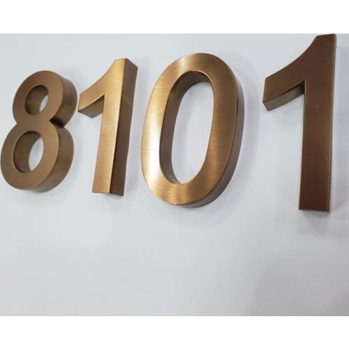 Vintage brushed brass channel letter door built-up letters painted stainless steel