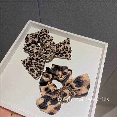 Korean leopard bow head rope autumn and winter temperament ball head rubber band hair rope hot girl ponytail hair ring headdress