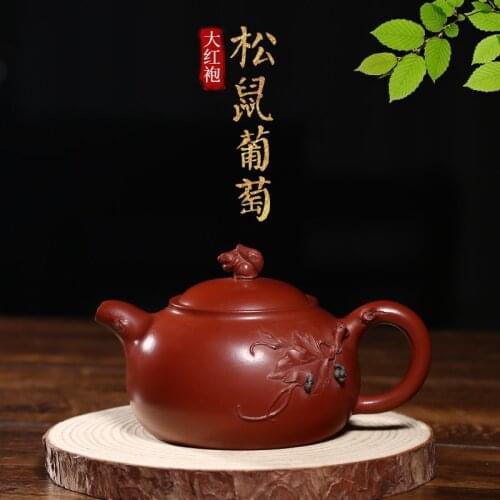 Yixing raw ore purple clay teapot pure handmade purple clay teapot brewing Kung Fu tea set Dahongpao squirrel grape