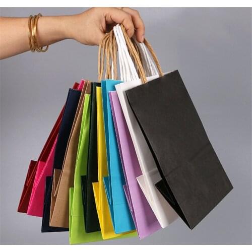 500pcs/lot 3 Size Fashionable kraft paper gift bag with handle/shopping bags/Christmas packing bag/Excellent quality
